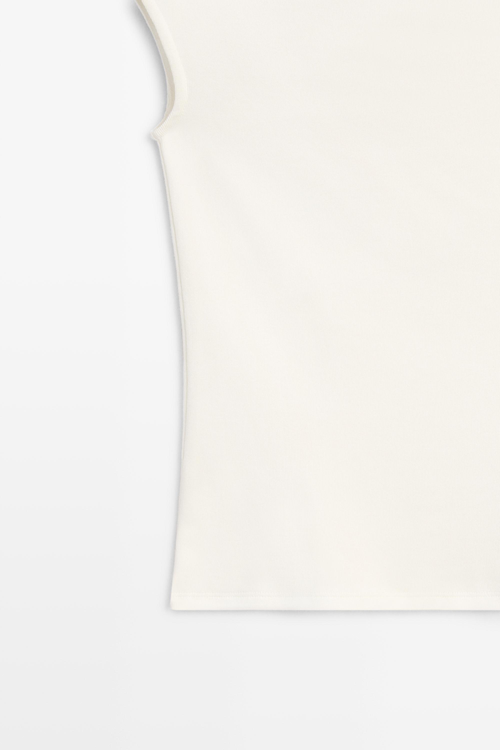 Top à col cheminée en maille extensible